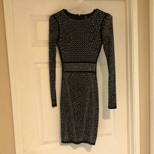 long sleeved covered in jewels, sheer sleeves